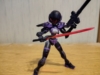 Acerby wielding her blaster and her sword