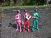 Action figures of the Patrangers from Lupinranger VS Patranger. Three color-coded characters: Patren 1gou (red), Patren 2gou (green), Patren 3gou (pink). Their masks are designed to look like police caps and have police badges in the center of them. Patren 2gou and 3gou are wielding VS Changers and Patren 1gou is wielding a VS Changer and a PatBo - effectively a megaphone that is also a baton. Patren 3gou has a skirt