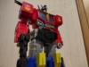 AOTP Star Convoy in robot mode, standing static with his gun held. Photo is angled up to look imposing, like you know this guy is going to be the hero to save the day.