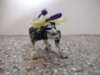 Energon Battle Ravage in beast mode with weapons attached - both are transparent green guns with one having a purple firing missile
