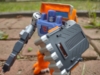 Kingdom Huffer in robot mode, with his gun and shield