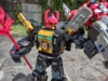 Legacy BlackZarak in robot mode, wielding the Tyrant Spear in one claw and gripping Legends Super Ginrai in his other claw and holding him in the air