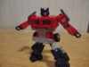 Optimus Prime in robot mode, but posed to demonstrate the articulation this toy actually has compared to the previous image