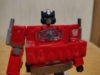 Optimus Prime in robot mode with his chest windows flipped down and showing the Matrix of Leadership in his chest