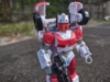 Legacy Minerva in robot mode, holding her gun but pointing it down