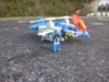 Retro Headmasters Highbrow in helicopter mode, with cockpit opened and Gorter standing in front of it